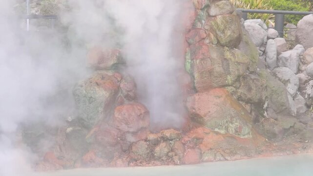 Umi Jigoku, (Sea hell), Kannawa district, Beppu City, Beppu Jigoku, Japan, steaming hot spring pond at Hells of Beppu tour, Oita Prefecture, Kyushu Island, vivid mineral colored geothermal water