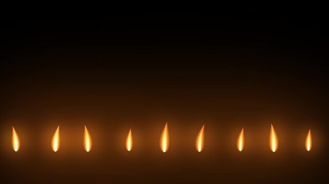 Row of realistic flickering diya flames glowing warmly on a black background, candle flame overlay for Diwali edits