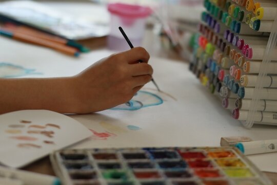 Small hands, big colors. Some frames are really about who's still discovering what a brush can do