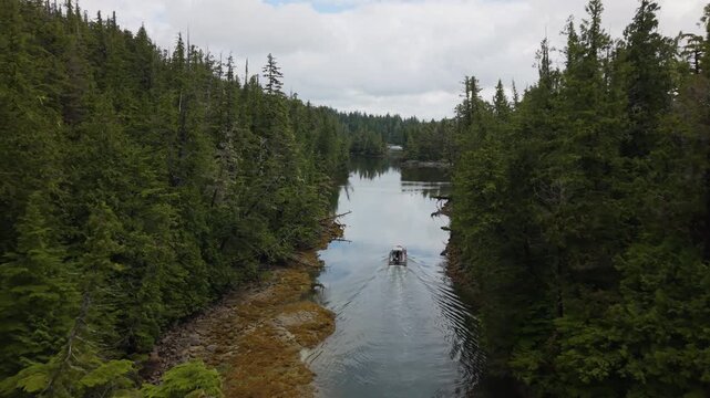 Drone aerial of north coast of British Columbia with crab trapping boat.