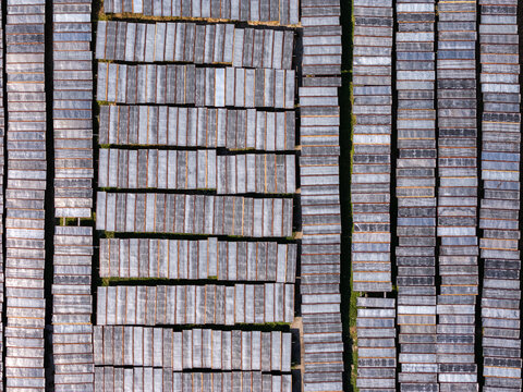 Aerial view of glass noodles on wooden drying racks in a grid pattern in Polanharjo, Central Java, Indonesia.