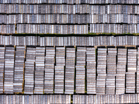 Aerial view of glass noodles on wooden drying racks in a grid pattern in Polanharjo, Central Java, Indonesia.