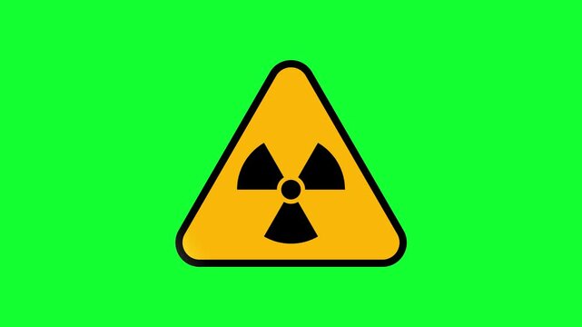 Yellow Radioactive Warning Symbol in Triangle on Green Screen Background