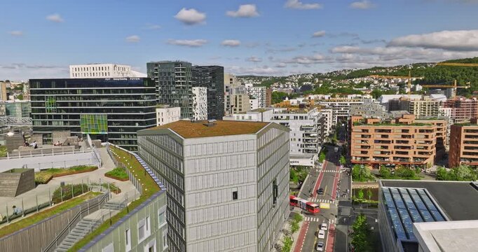 Oslo Norway Aerial v24 dramatic low level flyover opera house and museum capturing waterfront Gamle contemporary cityscape with fjord and islands view - Shot with Mavic 3 Cine - June 2022