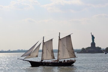 Sailing Ship By Statue of Liberty, NY © Grace