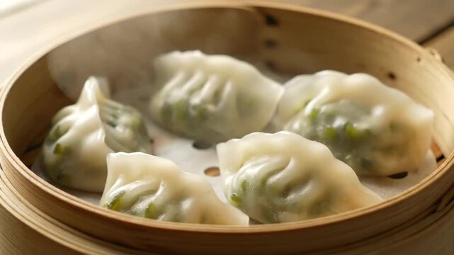 Steaming dumplings in a steamer, steaming dumplings in a steamer
