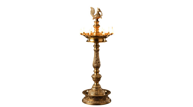 Traditional brass oil lamp with peacock top isolated on transparent background
