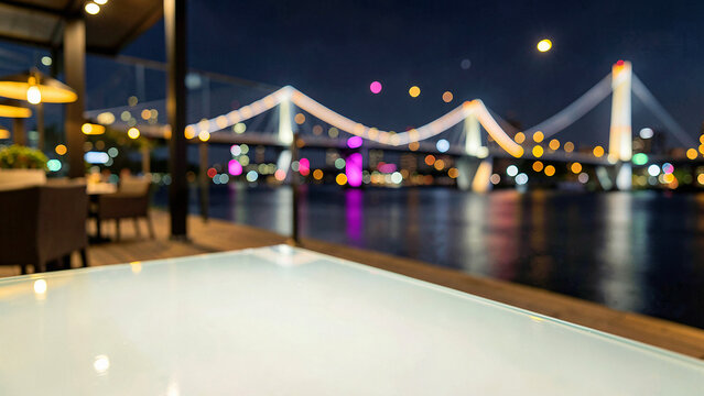 Matte Black Slate Table Surface on Exclusive Infinity Pool Deck Overlooking Twilight Skyline Luxury