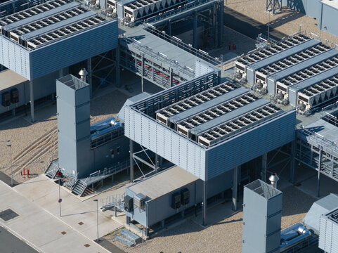 Aerial view of datacenter with industrial cooling units and metal infrastructure The Netherlands.