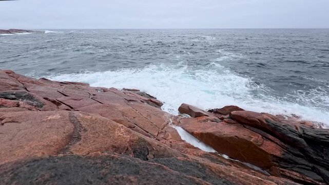 ocean waves crashing on rocky shore at green cove nova scotia