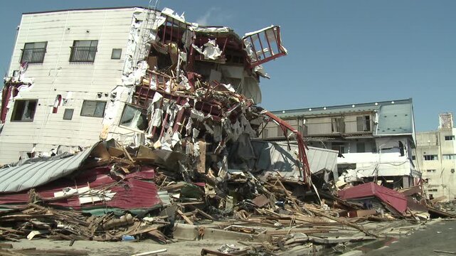 Destroyed Building Ripped Apart In Aftermath Of Tsunami In Japan
