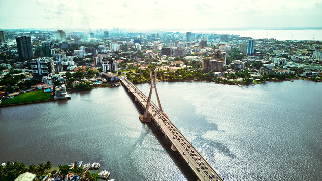 Aerial view of the Lekki-Ikoyi Link Bridge spanning the lagoon with urban skyline and traffic in Lagos, Lagos, Nigeria.