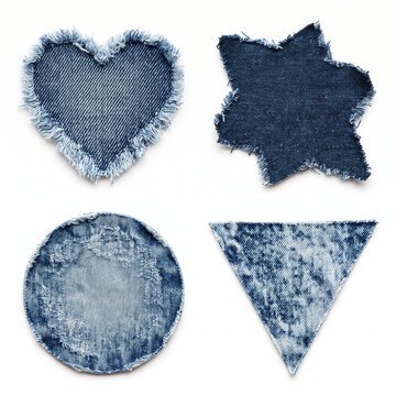 Four diverse denim fabric shapes including a heart star circle and triangle arranged artfully with frayed edges on a bright clean surface suitable for creative projects and crafting elements
