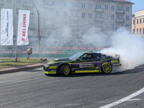 Grodno, Republic of Belarus. - June 27, 2026: Car drifting competition. A Nissan S13 race car is in the foreground.