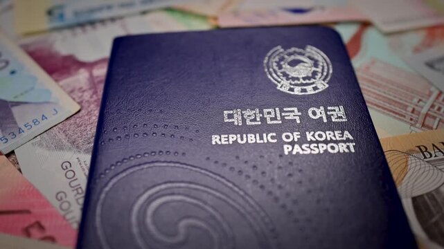 South Korean Passport With International Banknotes