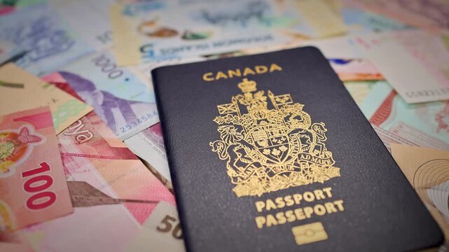 Canadian Passport On Assorted International Banknotes