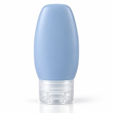 Empty light blue refillable travel size squeeze bottle for toiletries on white background