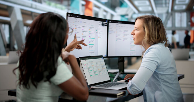 Governance Manager Carefully Reviews Risk Register During Corporate Audit