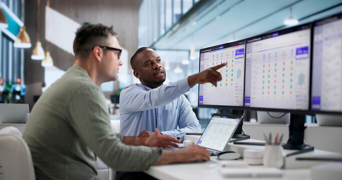 Procurement Manager Reviews Vendor Proposals On Laptop
