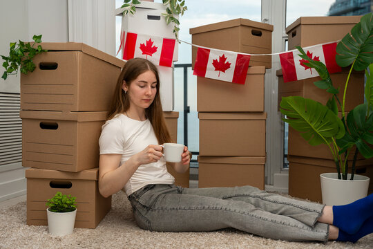 Woman Taking a Coffee Break After Moving to Canada