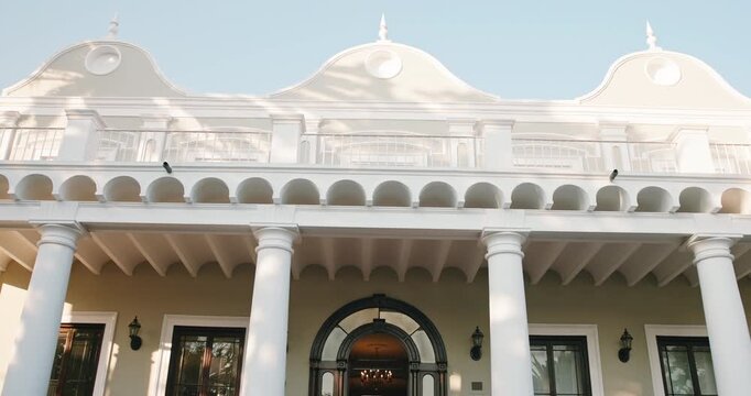 Education, stairs and entrance of university with architecture, building and opportunity in city. Infrastructure, campus and about us of college with front door, development and steps for growth