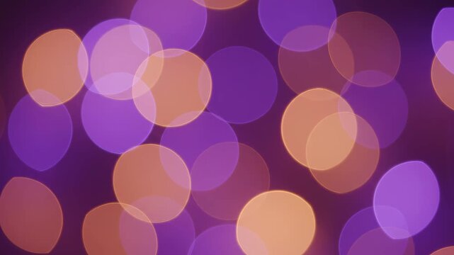 Soft bokeh lights drifting in dreamy purple and gold hues during a gentle camera zoom out