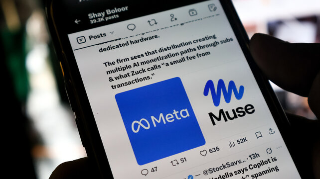 Person holding smartphone displaying social media post about Meta and Muse AI monetization plans.