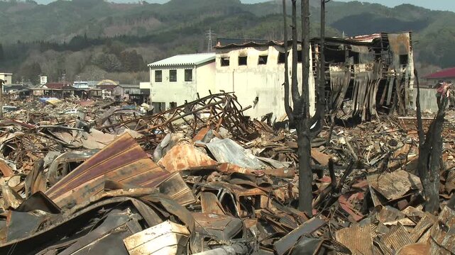 Burnt Out Debris And Destroyed Building In Aftermath Of Tsunami In Japan