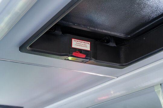 Bus interior roof emergency exit hatch