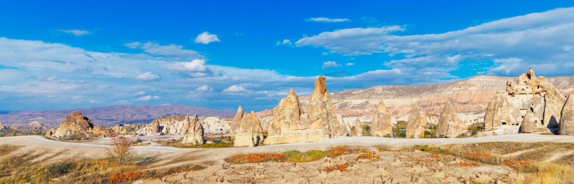 Panoramic view of fairy chimneys and rock formations in Goreme valley Cappadocia Turkey
