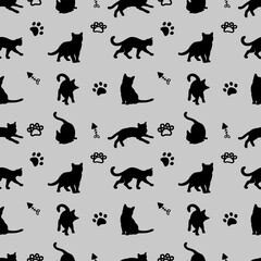 Obraz premium black cat silhouette pattern seamless with paw print and fishbone
