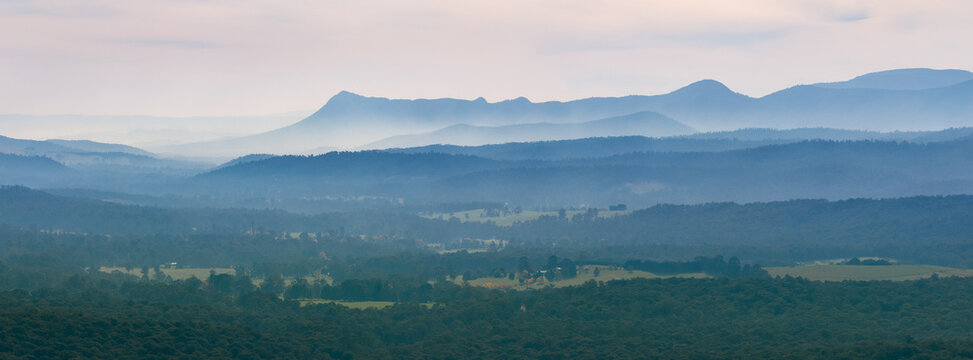 Distant panorama view of hazy mountains and valleys