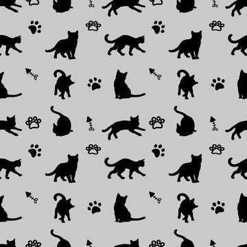 black cat silhouette pattern seamless with paw print and fishbone