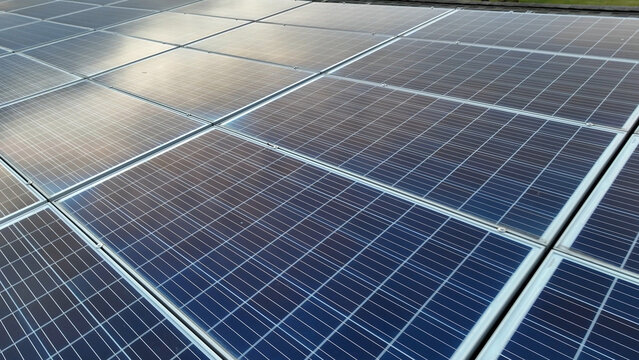 Aerial view of solar panels installed on a residential roof in Akron, Pennsylvania, United States.