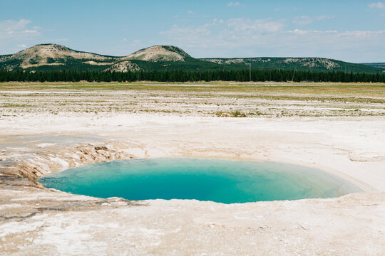 A vibrant blue hot spring in Yellowstone National Park
