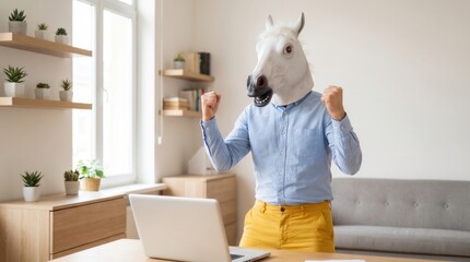 Fototapeta premium Funny man wearing horse head mask celebrating success with raised fists in blue shirt against home office background with shelves and boxes. Concept of humor and unexpected joy