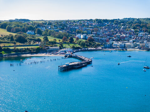 Aerial shot of Swanage Pier on a calm sunny day.