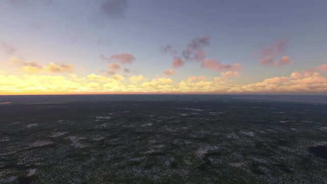 Sunset aerial view of the snow Yamal Peninsula. Yamalo Nenets Autonomous Okrug. Russia