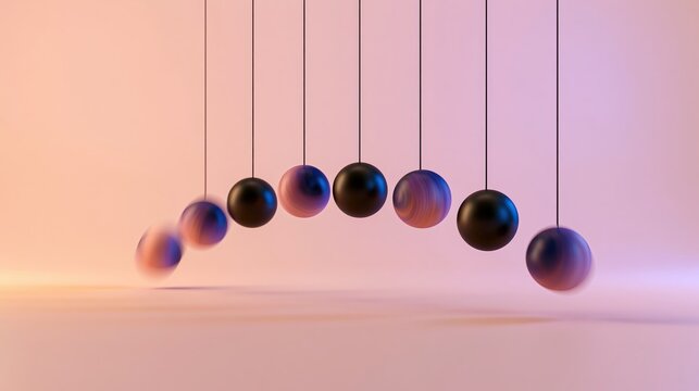 Pendulum balls demonstrate motion and physics principles.