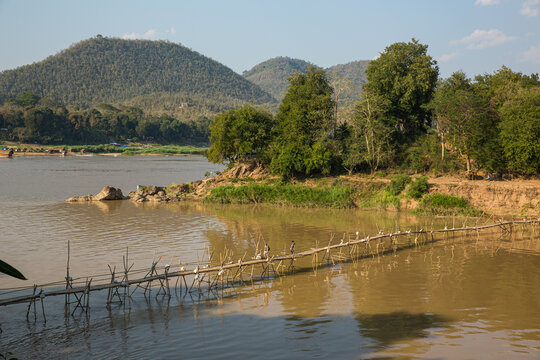 Bamboo bridge crossing the Nam Khan river in Luang Prabang