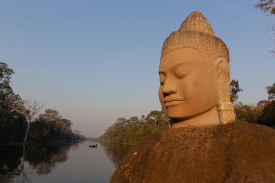 Serene stone deva face at Angkor Thom gate