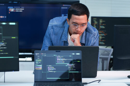 Programmer Developing Software with Artificial Intelligence Code