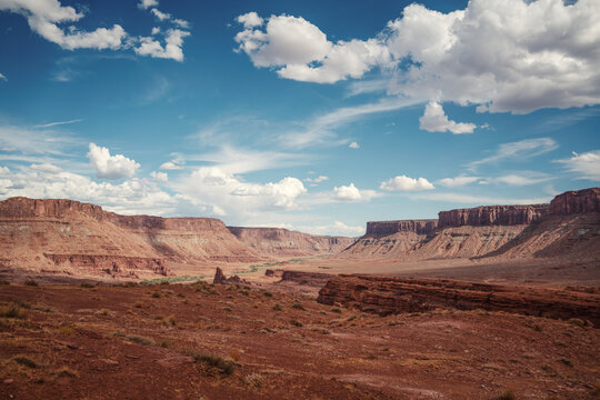 Expansive desert canyon landscape in Utah on a sunny day