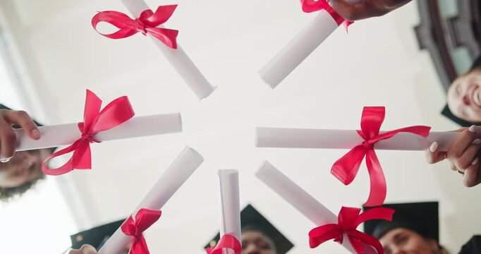 Hands, students and diploma in circle for graduation pride, degree completion and qualification. Below, happy people and scroll in campus huddle for graduate class, PHD celebration and certification