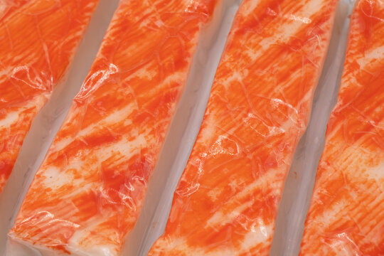 Crab meat in vacuum package background. Crab meat