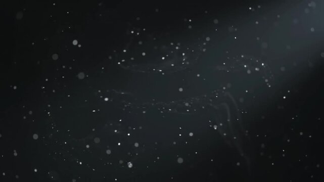 cinematic footage of extremely fine airborne dust particles slowly flowing through a dark minimalist studio, soft volumetric studio illumination gently revealing particles at different distances