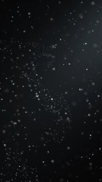 Minimal floating dust particles suspended in a deep matte-black studio environment, extremely fine microscopic dust particles drifting slowly and naturally through soft diffused volumetric studio ligh