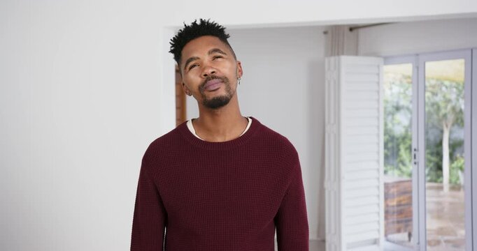 High speed photography for dynamic scenes, thinking deeply, man in maroon sweater looking up in brig