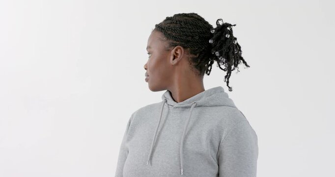 High speed photography for dynamic scenes, Wearing hoodie, woman with braided hair looking to side