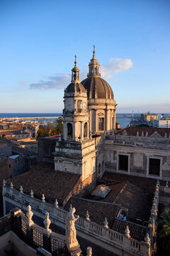 Catania, Italy; 1st September 2026: The historic Cathedral of Saint Agatha in Catania stands tall against a clear blue evening sky